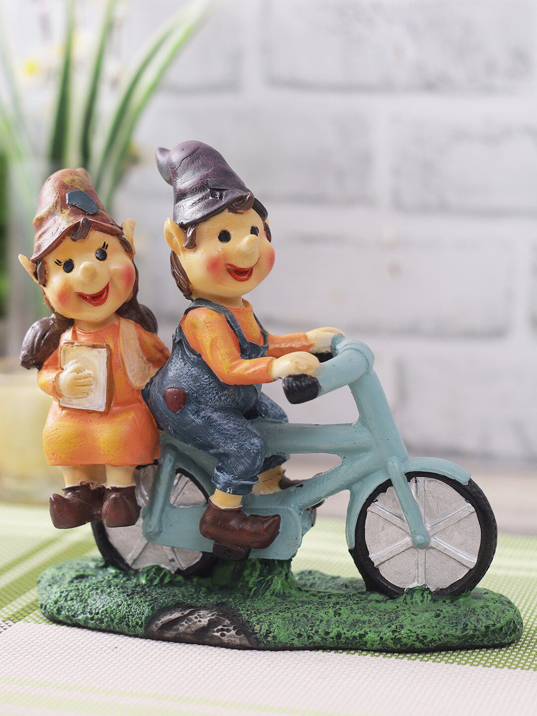 CraftVatika Orange & Blue Cute Romantic Love Couple On Cycle Miniature Statue Showpiece Price in India