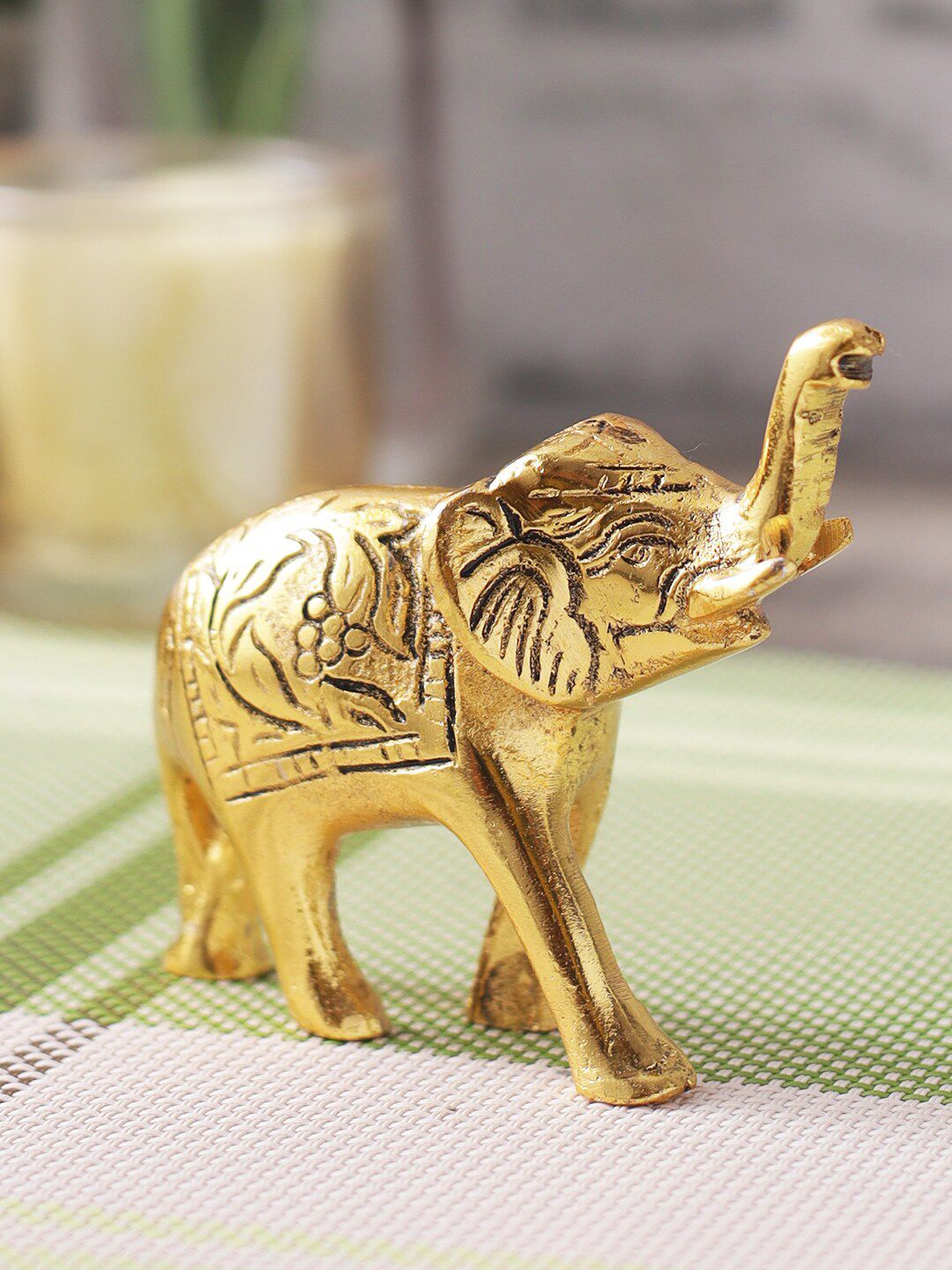 CraftVatika Gold-Toned Elephant Trunk Up Showpiece Price in India