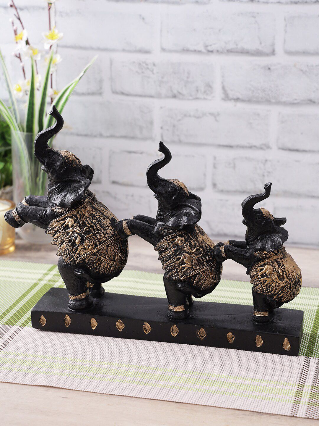 CraftVatika Black & Copper-Toned Polyresin Trunk Up Elephant Statue Showpiece Price in India