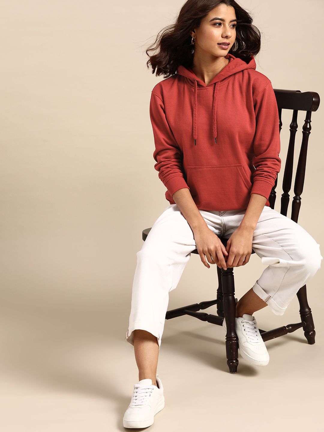all about you Women Rust Red Solid Hooded Sweatshirt Price in India