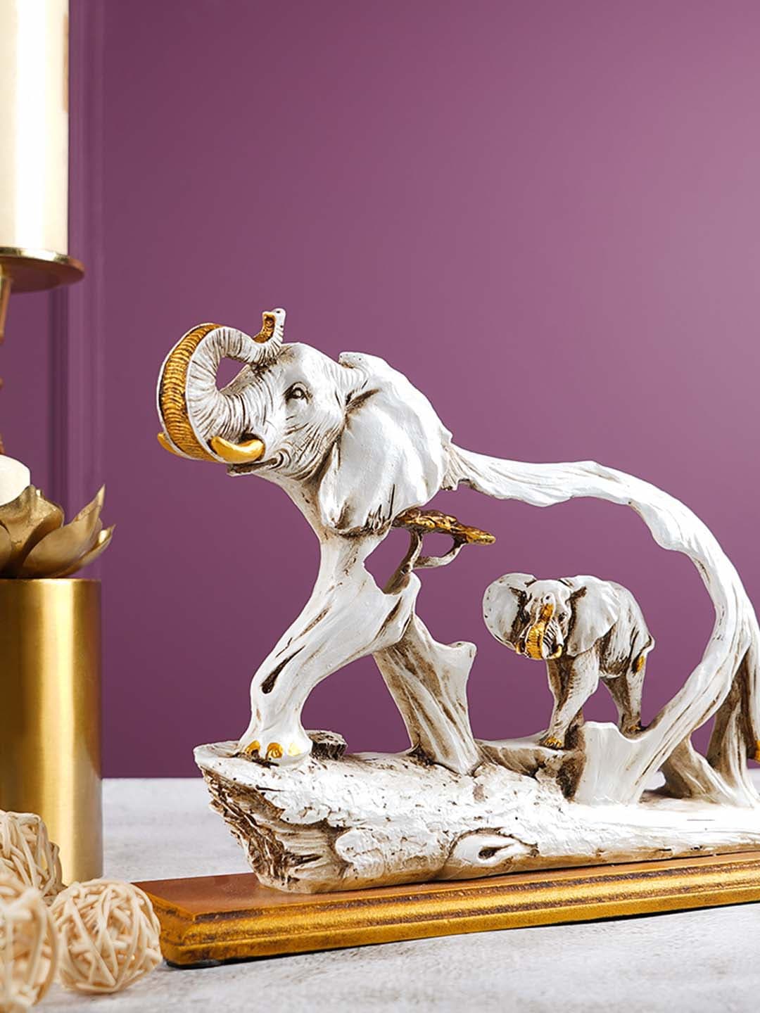 THE ARTMENT White & Gold-Toned Elephant Fengshui Showpiece With Wooden Base Price in India