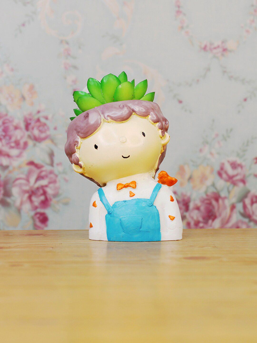 Wonderland White & Blue Boy With Bird Resin Planter Price in India