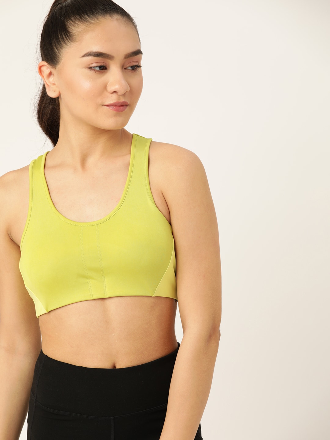 DressBerry Lime Green Solid Lightly Padded Workout Bra Price in India