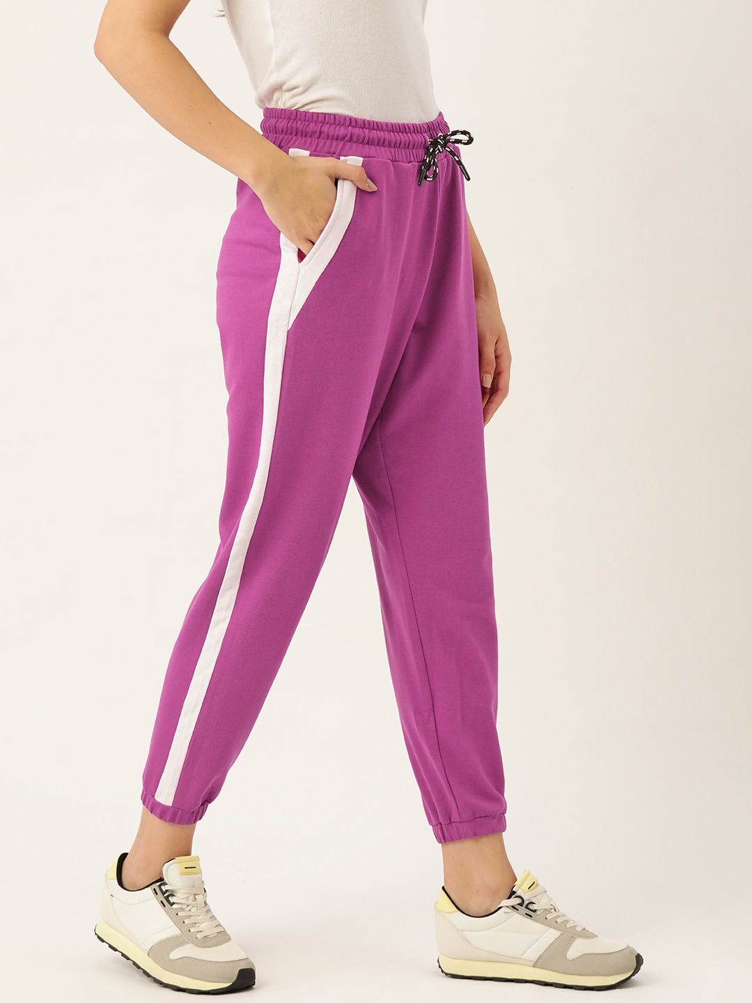 DressBerry Women Purple Solid Joggers With Side Striped Detail Price in India