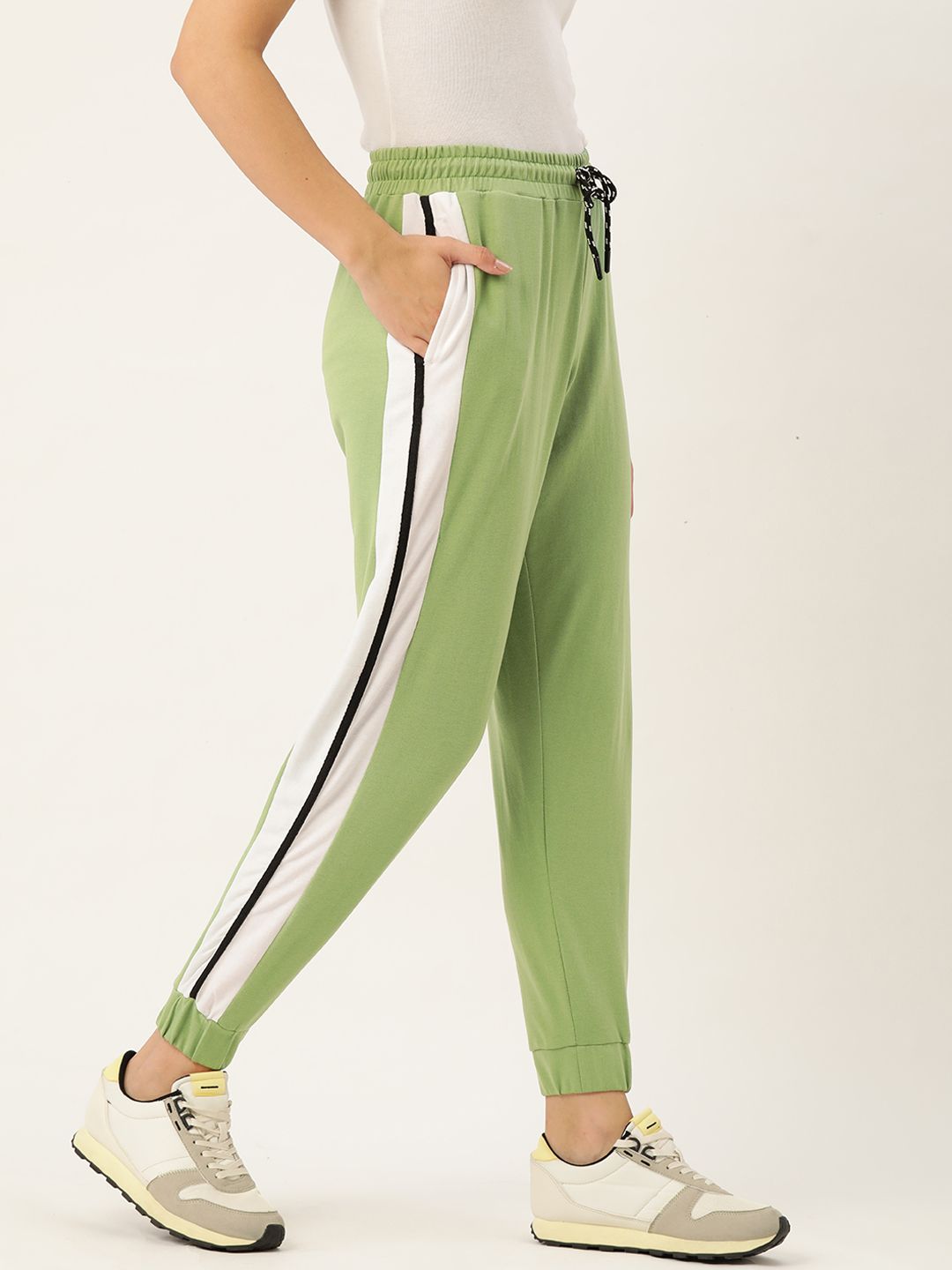 DressBerry Women Green Solid Joggers With Side Striped Detail Price in India