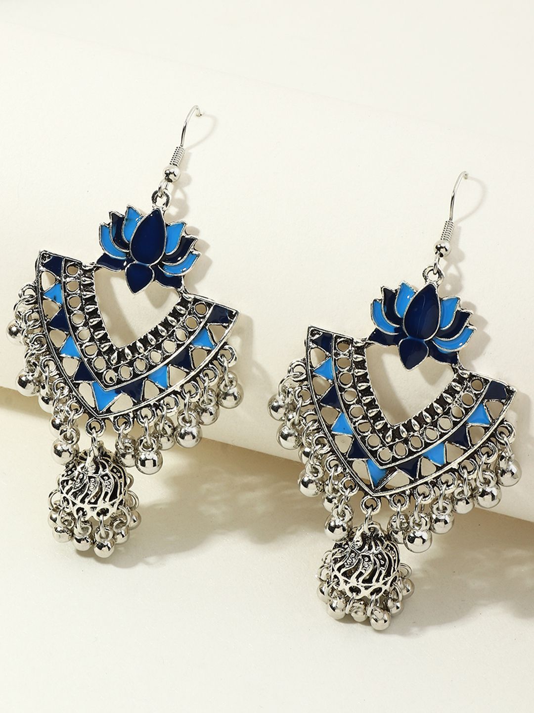 URBANIC Silver-Toned & Blue Oxidised Dome Shaped Enmelled Jhumkas Price in India
