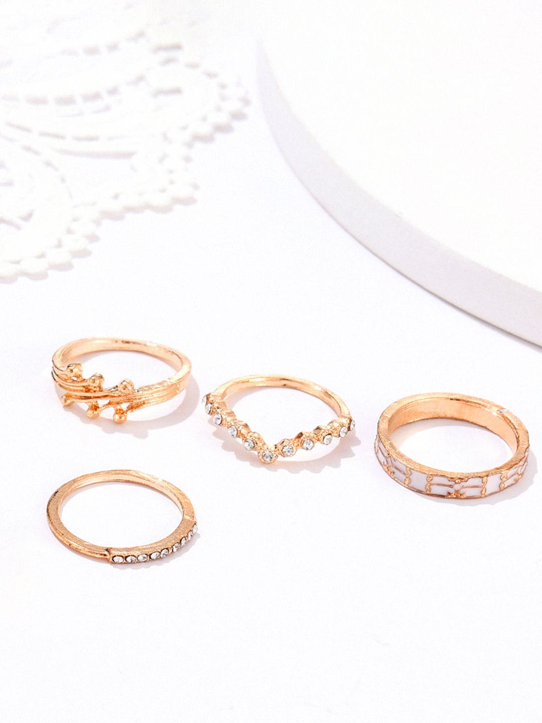 URBANIC Set of 4 Gold-Toned Stone Studded Finger Rings Price in India
