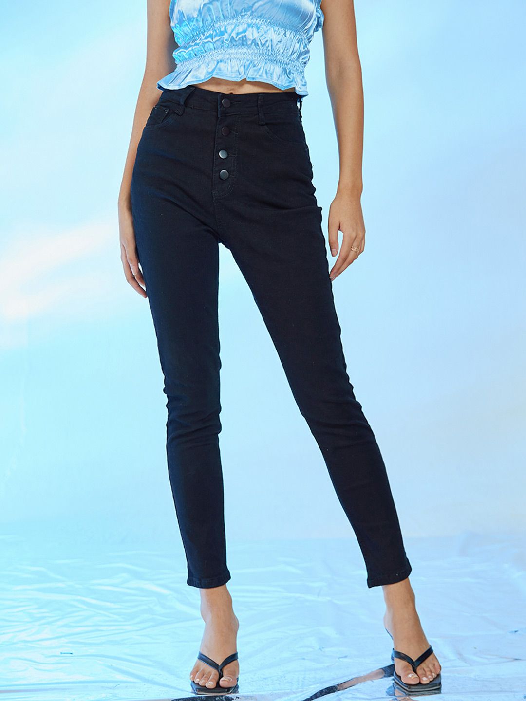 URBANIC Women Black Solid Skinny Fit Mid Rise Cotton Jeans Price in India