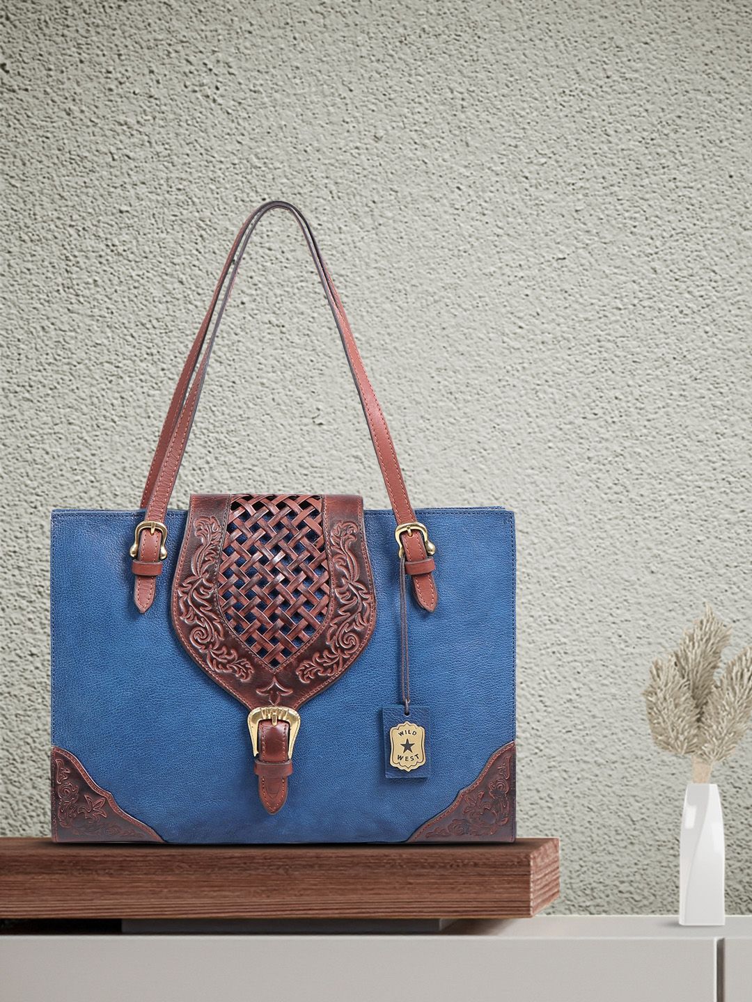 Hidesign Blue Leather Structured Handheld Bag Price in India
