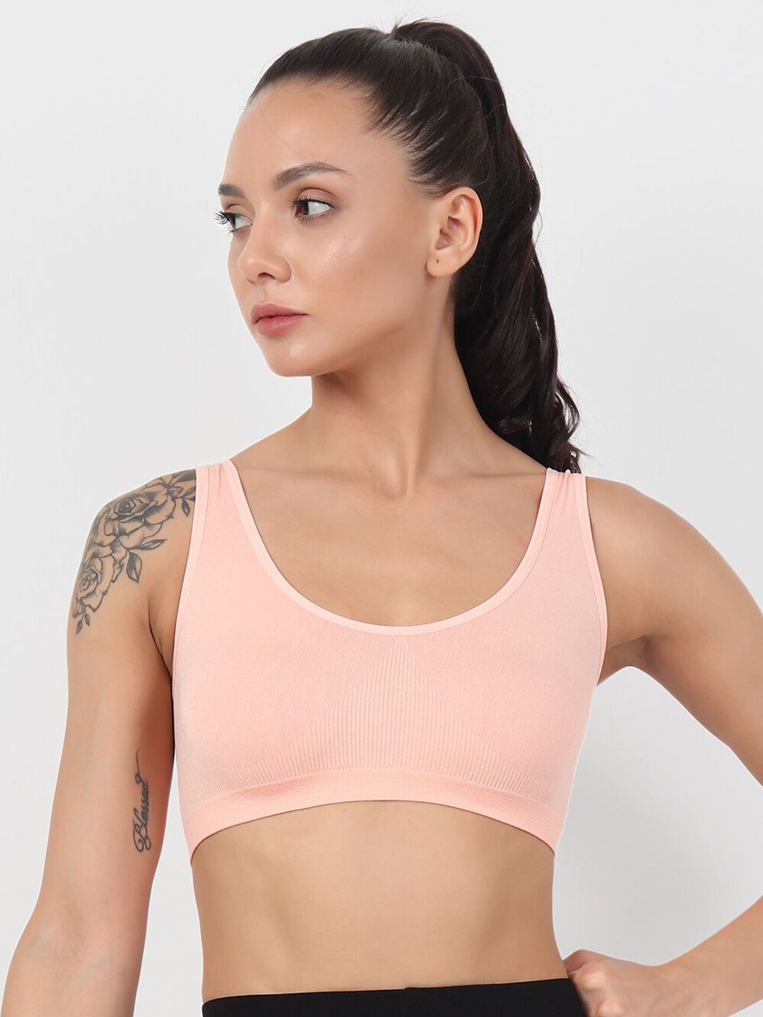 XOXO Design Peach Solid Dri Fit Technology Workout Bra - Non-Padded Non-Wired Price in India