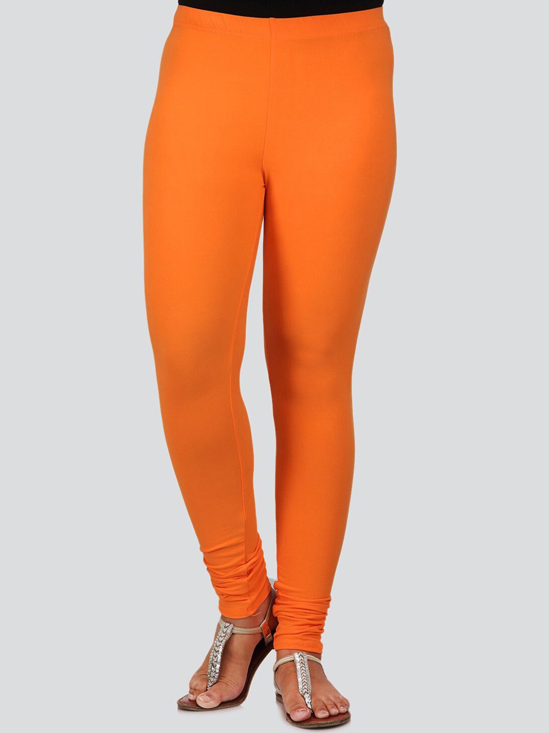 PinkLoom Women Orange Solid Churidar-Length Leggings Price in India