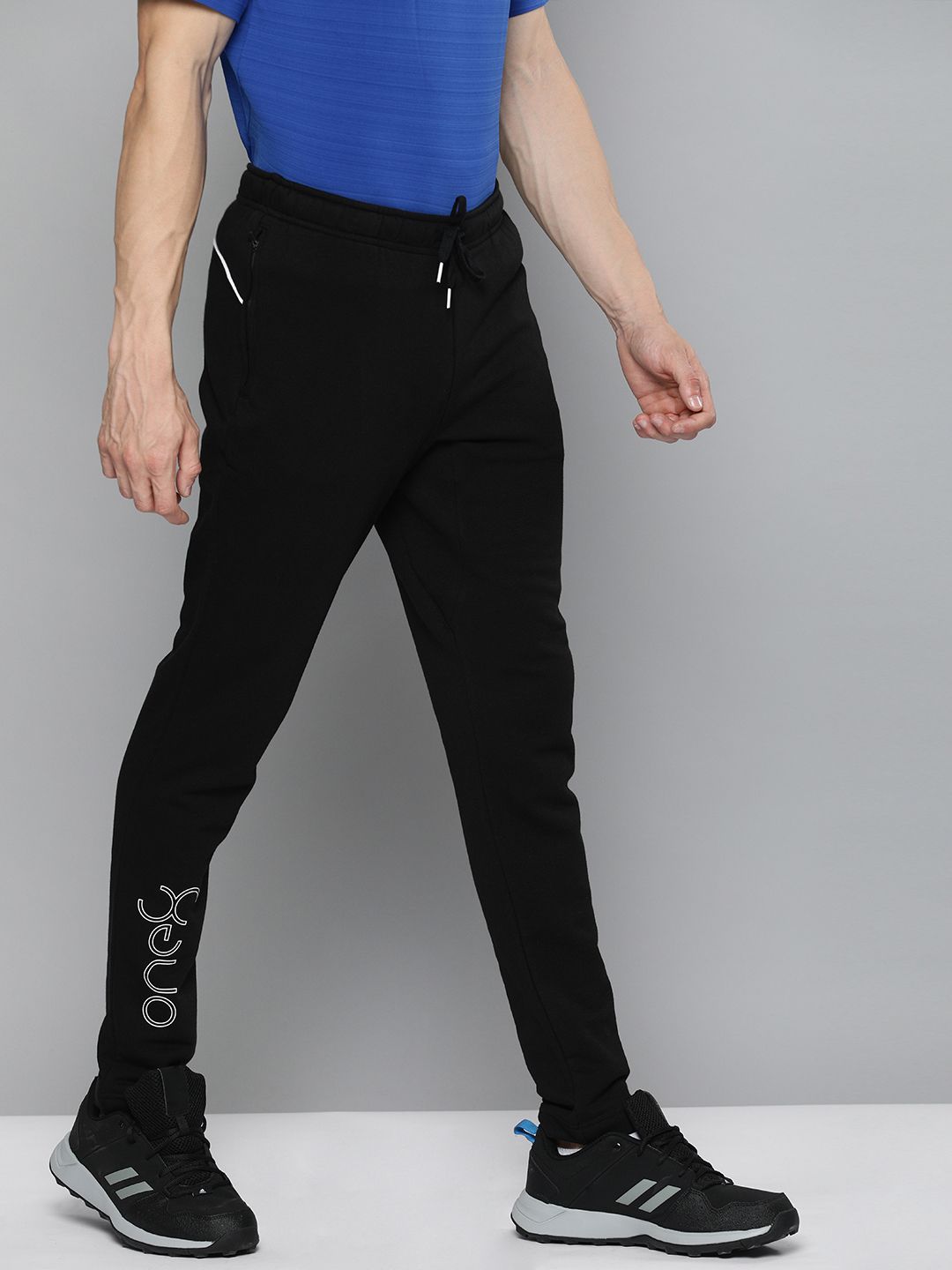 Buy one8 x PUMA Men Slim Fit Virat Kohli Logo Track Pants - Track