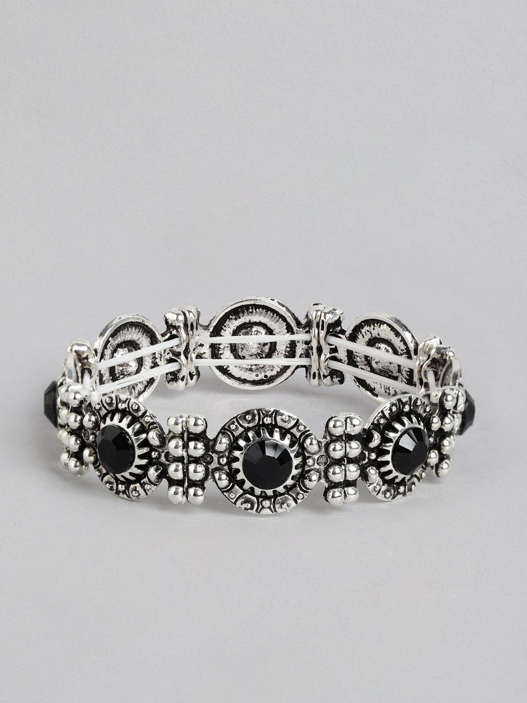 Kord Store Women Silver-Toned & Black Oxidised Charm Bracelet Price in India