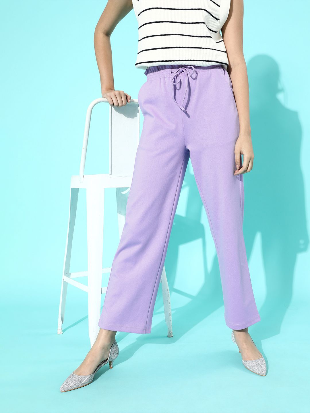 Moda Rapido Women Elegant Lavender Solid Kick Flare Trousers Price in India