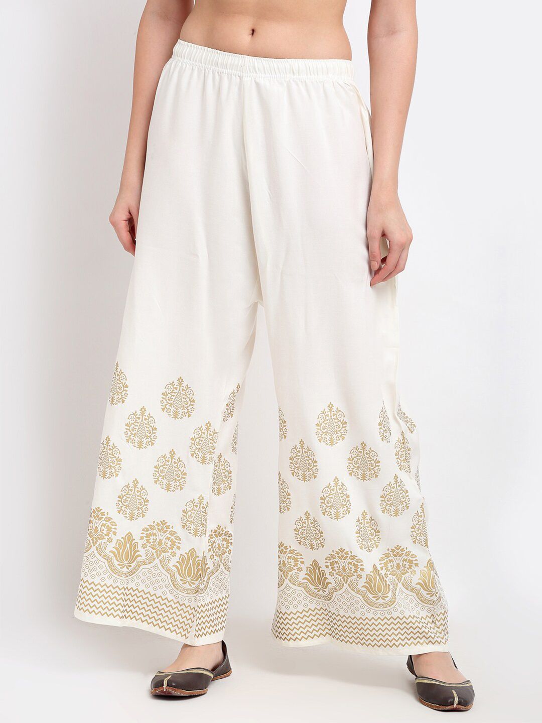 TAG 7 Women White & Gold-Toned Printed Flared Palazzos Price in India