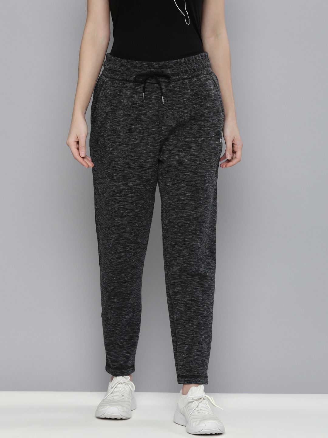 Puma Women Black Printed Regular Fit DryCell Evostripe Track Pants Price in India