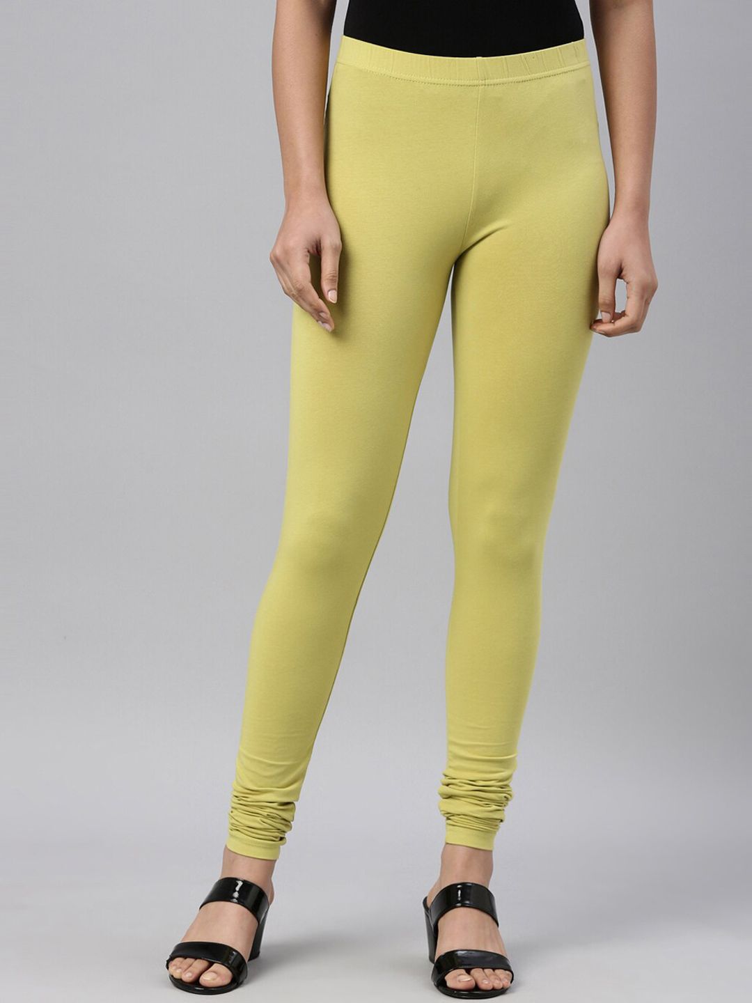 Go Colors Women Lime Green Solid Churidar-Length Leggings Price in India