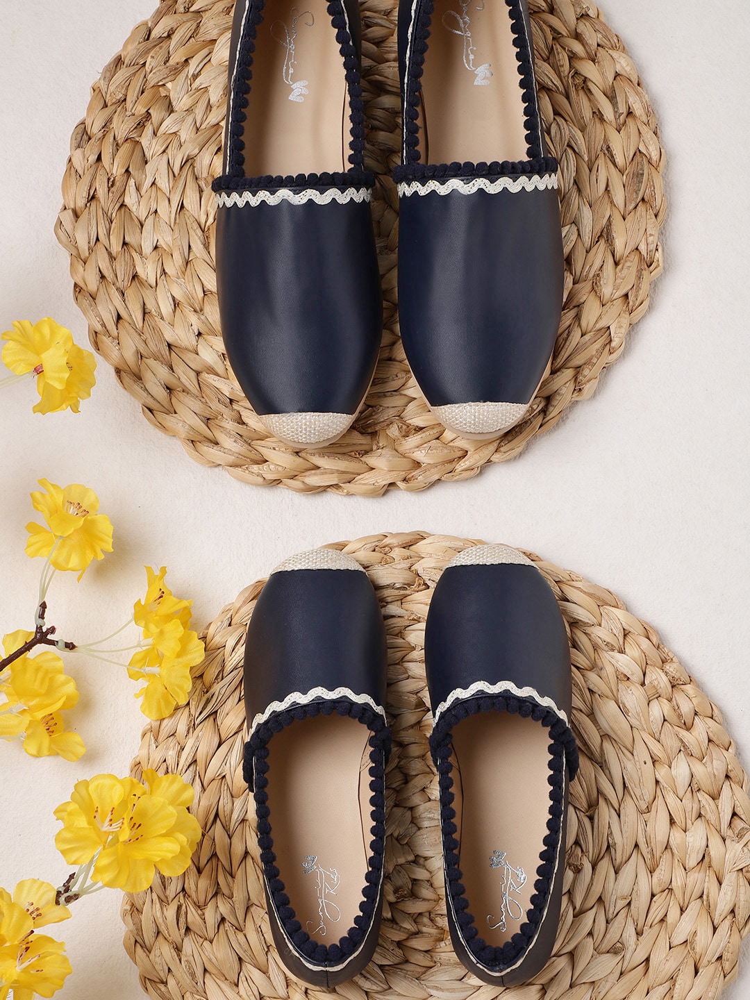 Sangria Women Navy Blue Solid Slip-Ons with Pom-Pom Detail Price in India
