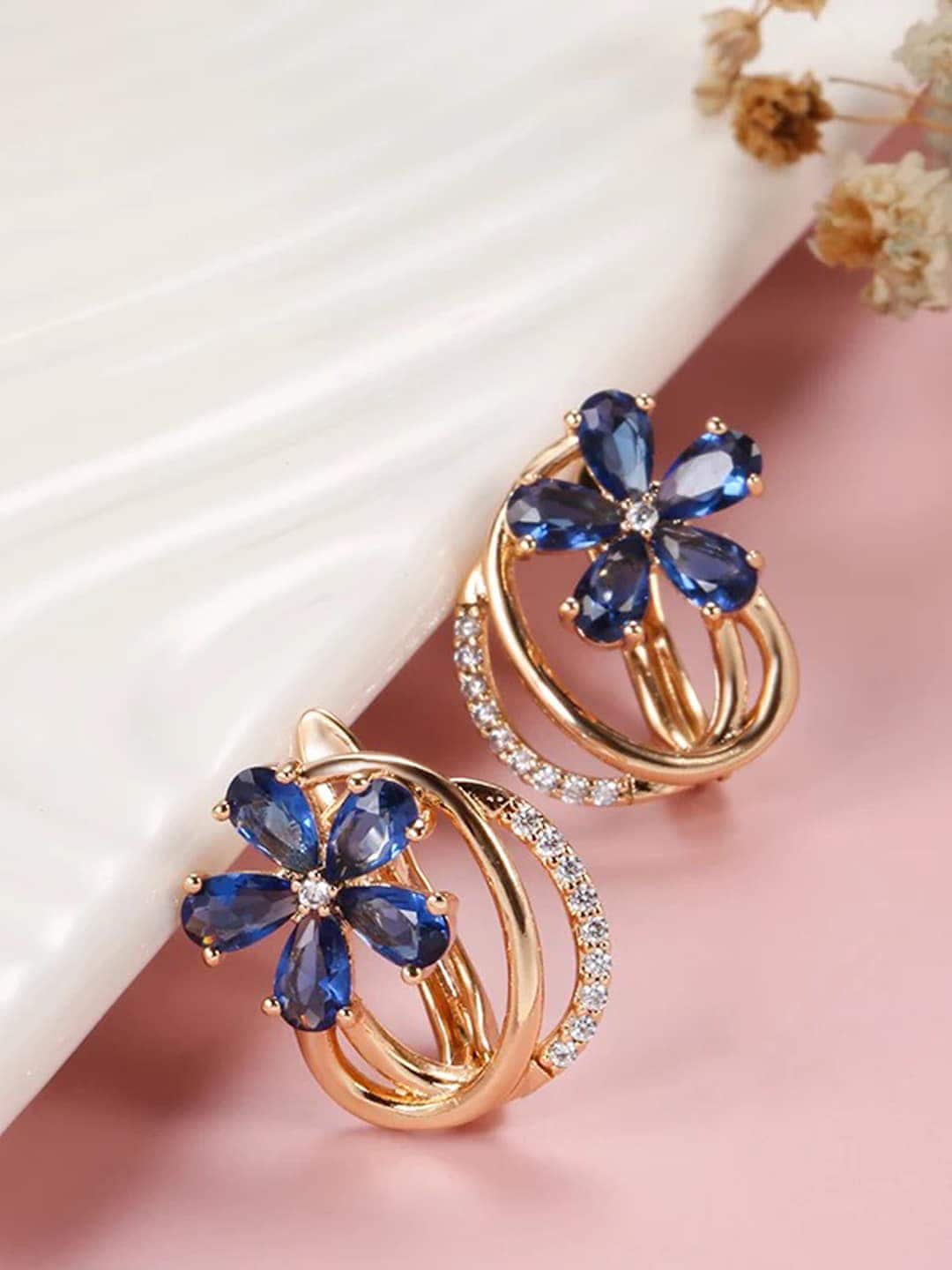 Shining Diva Fashion Rose Gold-Plated  Blue Floral Studs Earrings Price in India