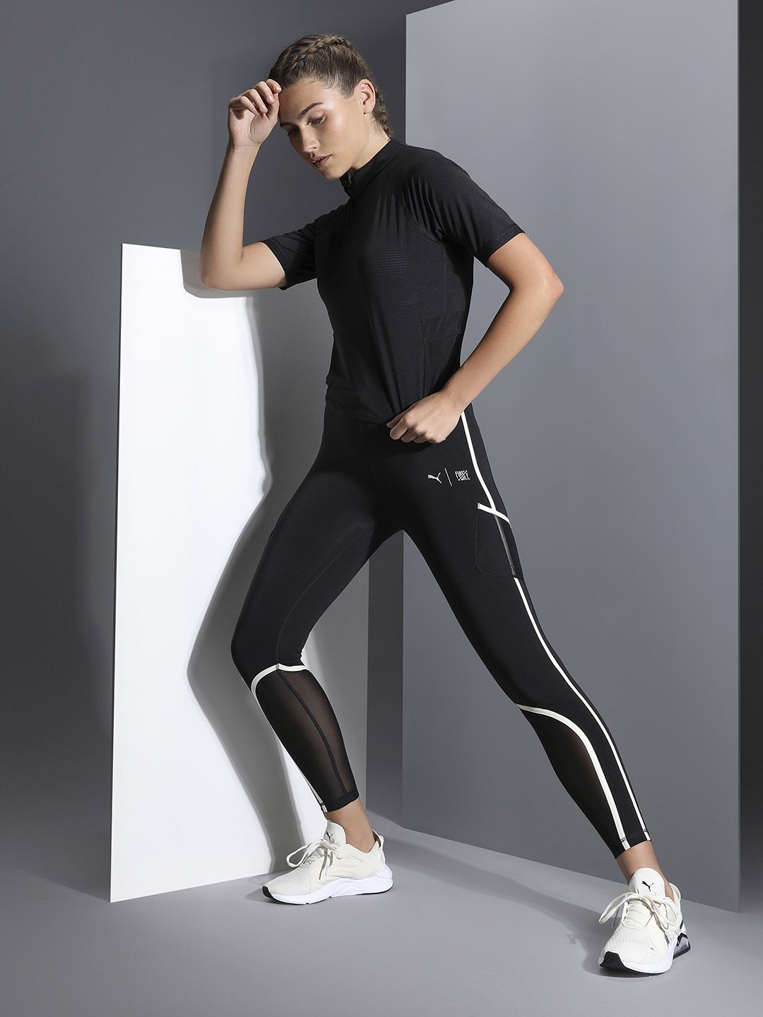 Puma x FIRST MILE Mock Women Black Brand Logo High Neck Training or Gym T-shirt Price in India