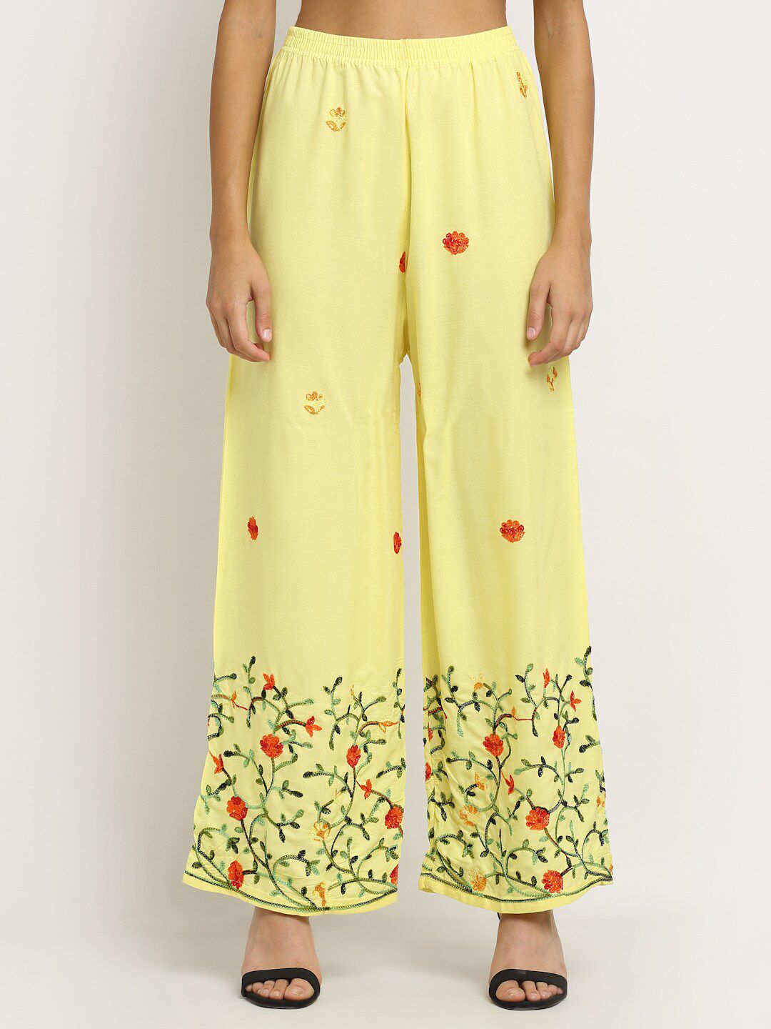 NEUDIS Women Yellow & Red Floral Embroidered Palazzos Price in India