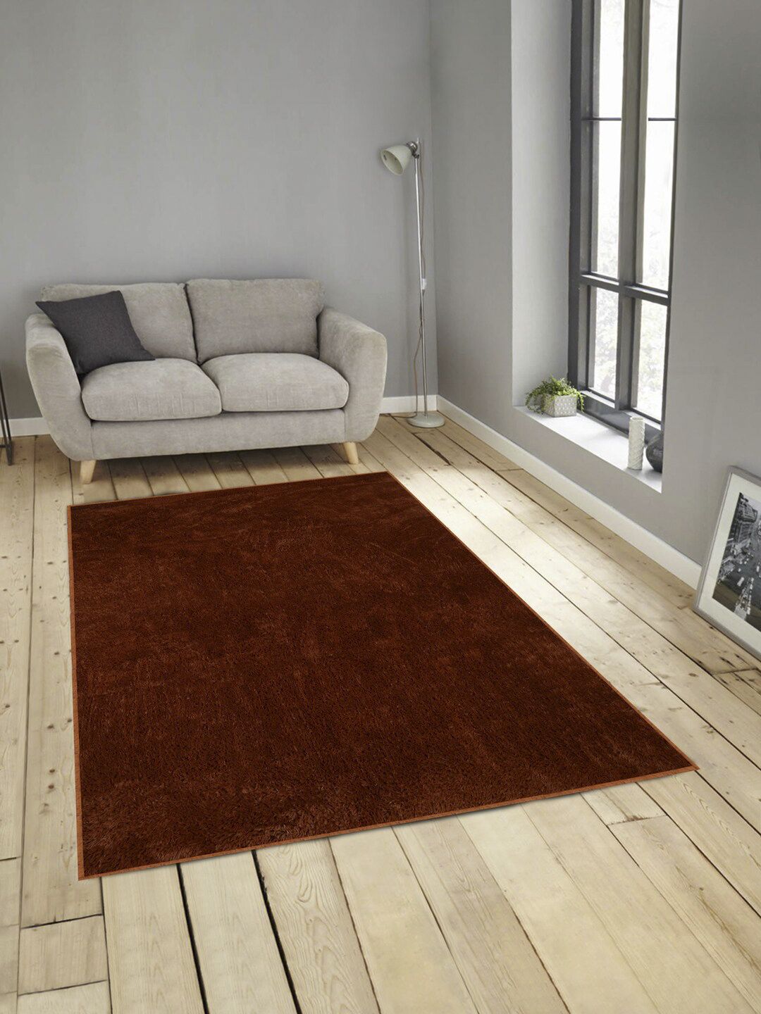 Arrabi Brown Solid Shaggy Carpet Price in India