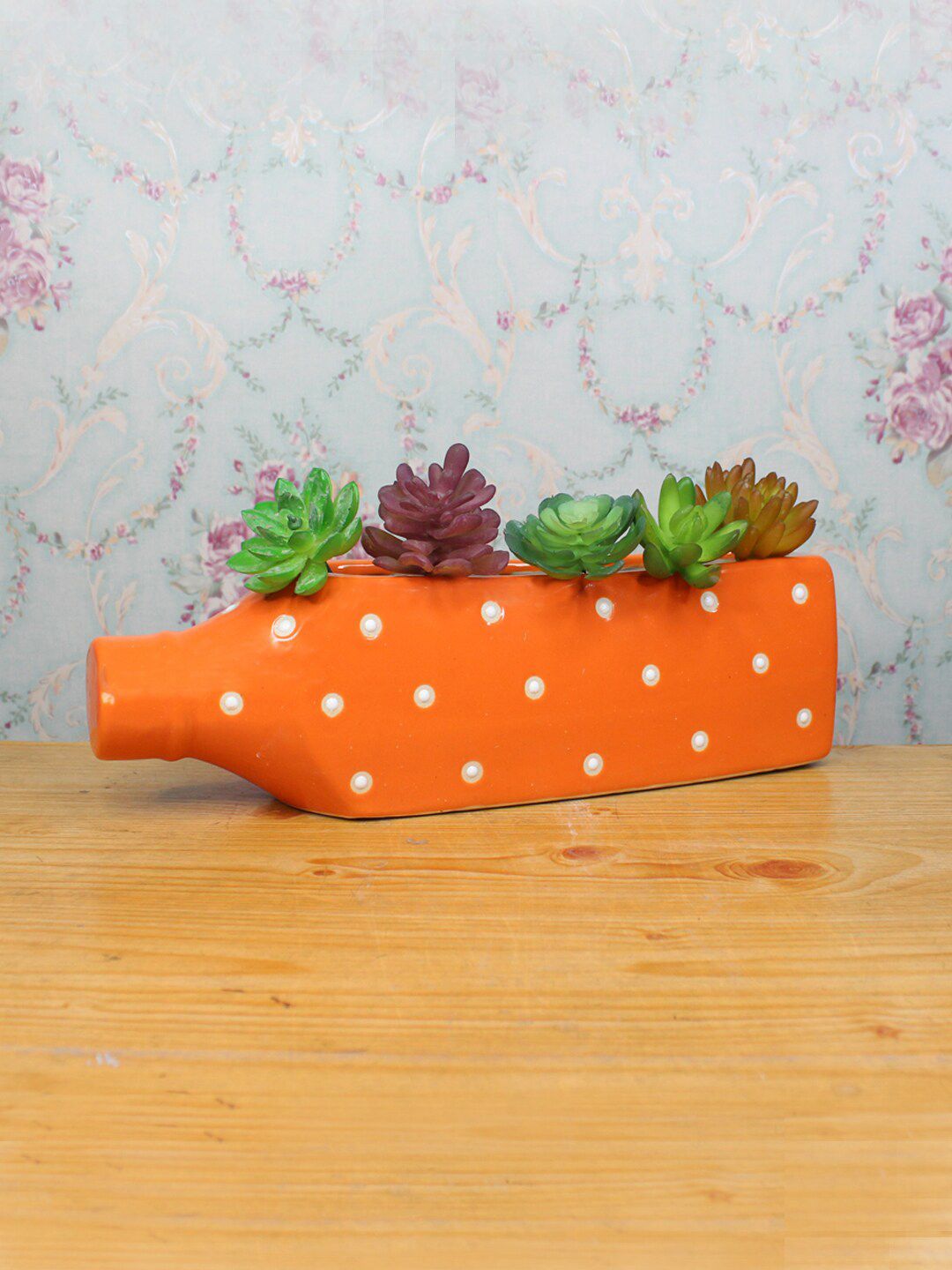 Wonderland Orange Ceramic Polka Dot Printed Bottle-Shaped planter Price in India