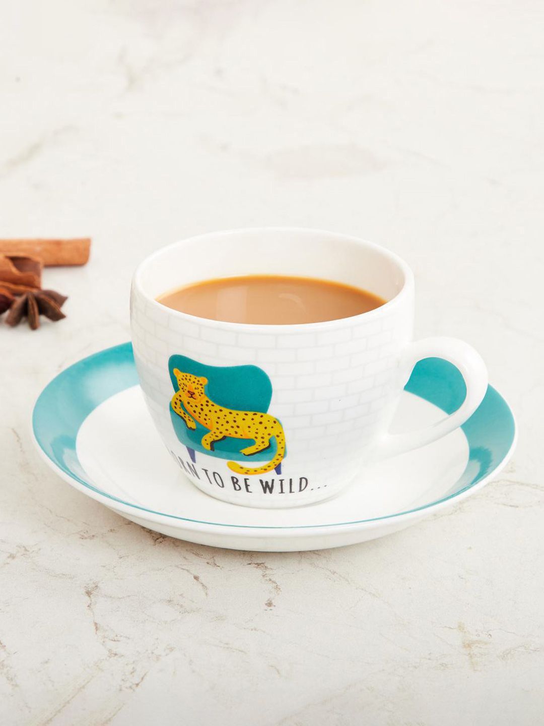 Home Centre White & Blue Urban Jungle Printed Bone China Cup and Saucer Set Price in India