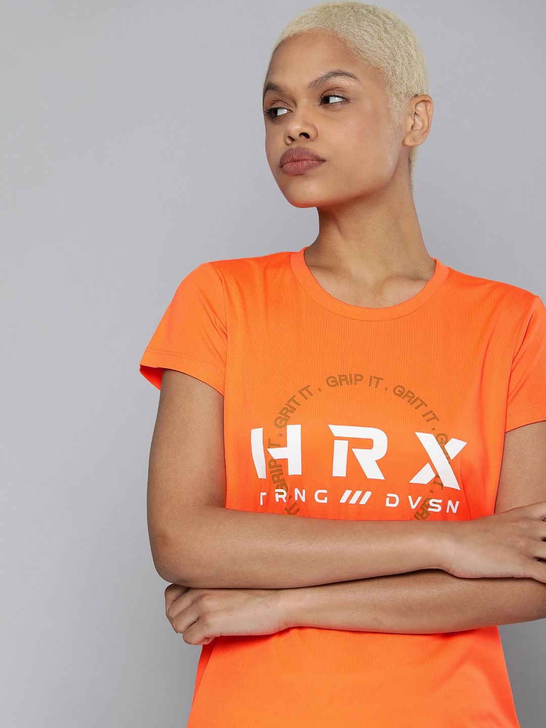 HRX By Hrithik Roshan Training Women Neon Orange Rapid-Dry Brand Carrier Tshirts Price in India