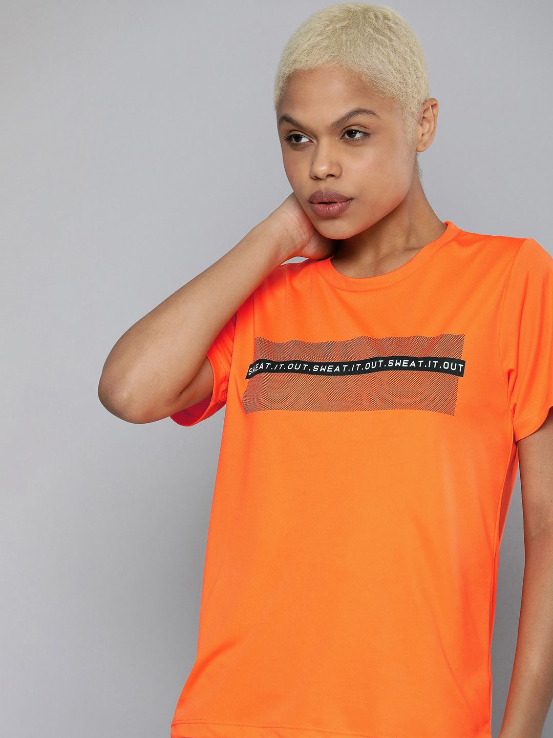 HRX By Hrithik Roshan Training Women Neon Orange Rapid-Dry Typography Tshirts Price in India
