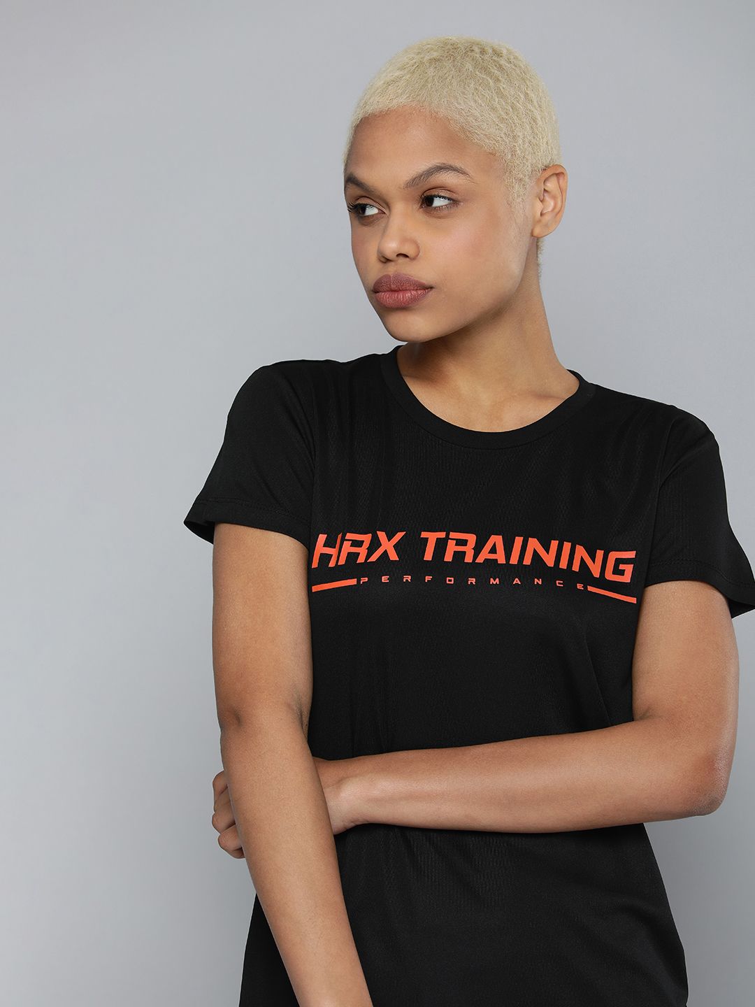 HRX By Hrithik Roshan Training Women Jet Black Rapid-Dry Brand Carrier Tshirts Price in India