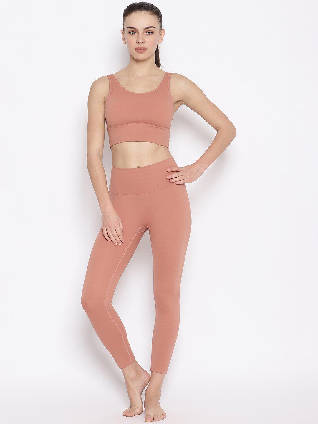 iki chic Women Peach-Coloured Solid Track Suit Price in India