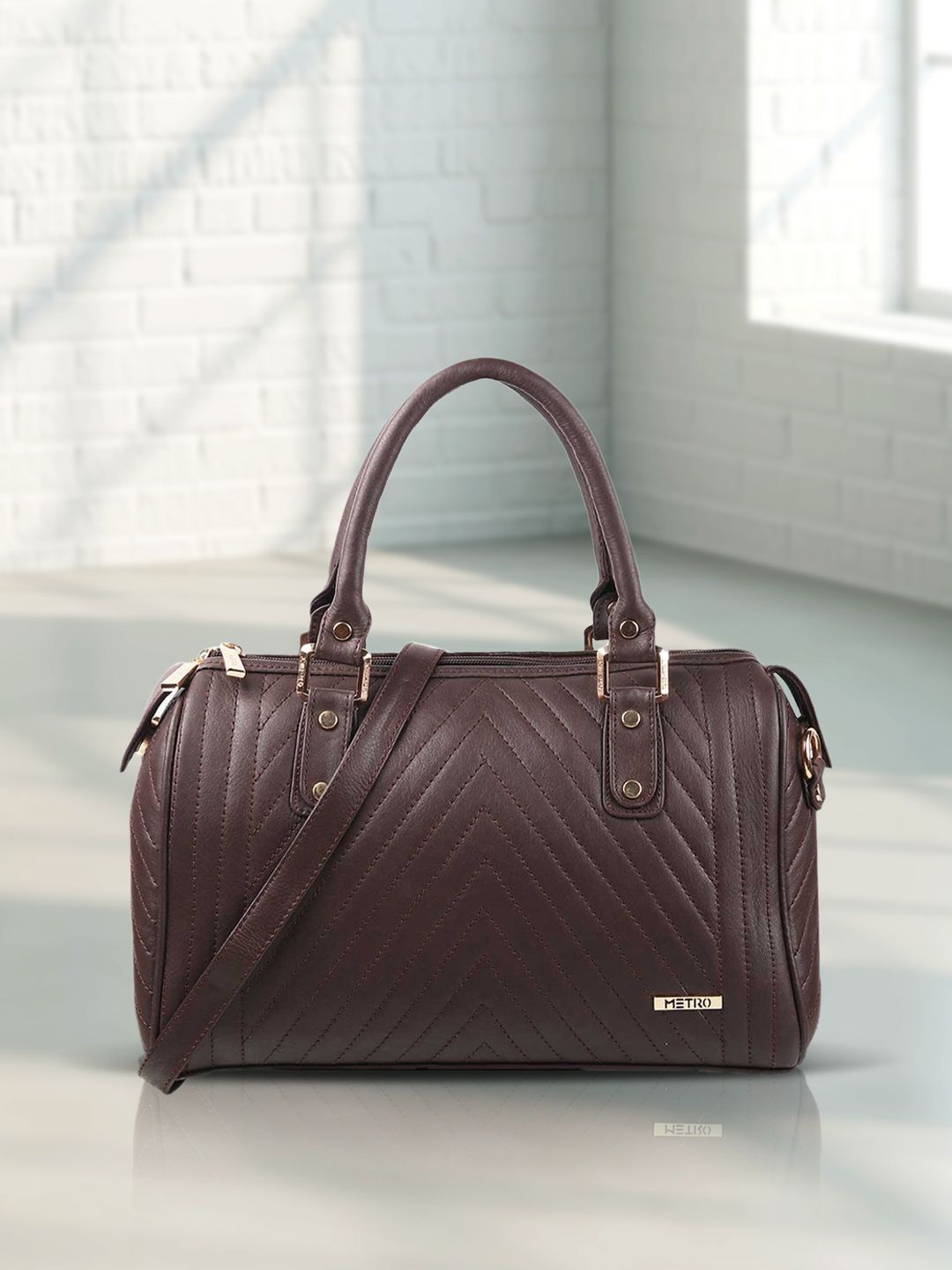 Metro Women Brown Leather Handheld Bag with Quilt Price in India