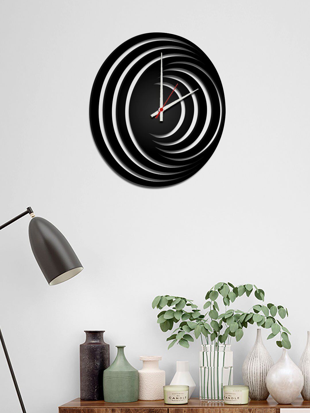 WALLMANTRA Black & White Abstract Hurricane Logo Contemporary Wall Clock Price in India