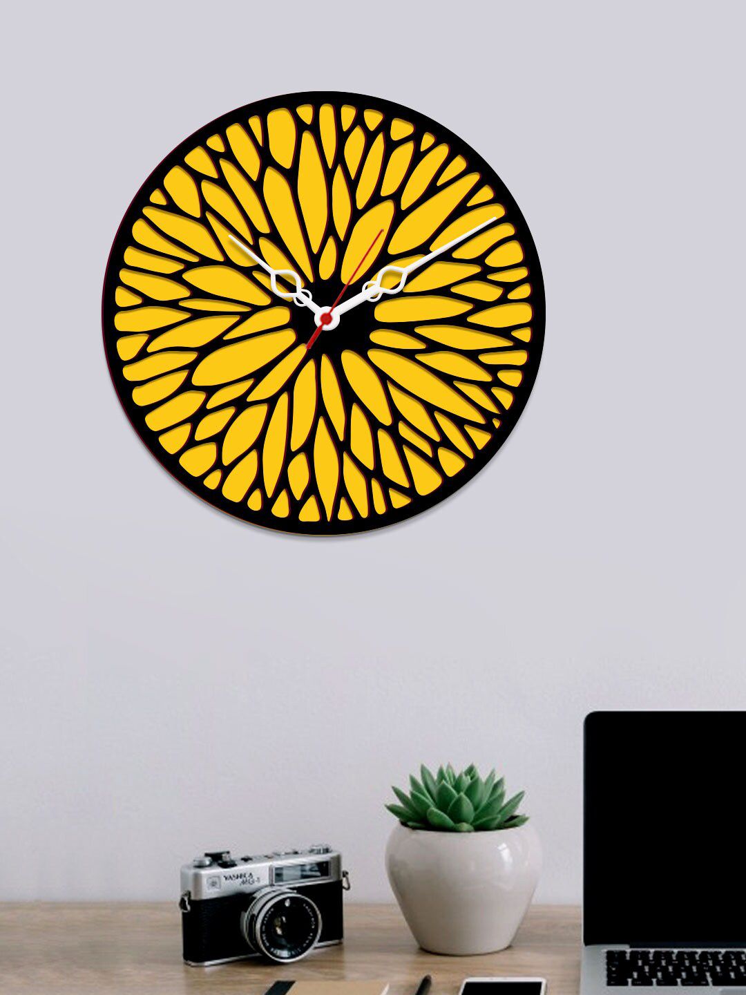 WALLMANTRA Yellow & Black Abstract Flower Design Contemporary Wall Clock Price in India