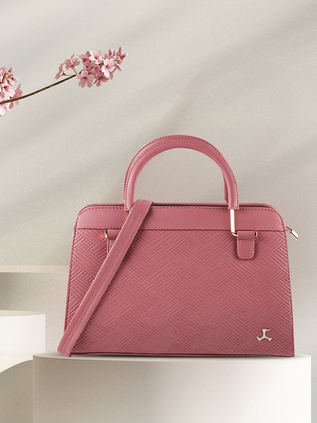 Mochi Pink Textured PU Structured Handheld Bag Price in India
