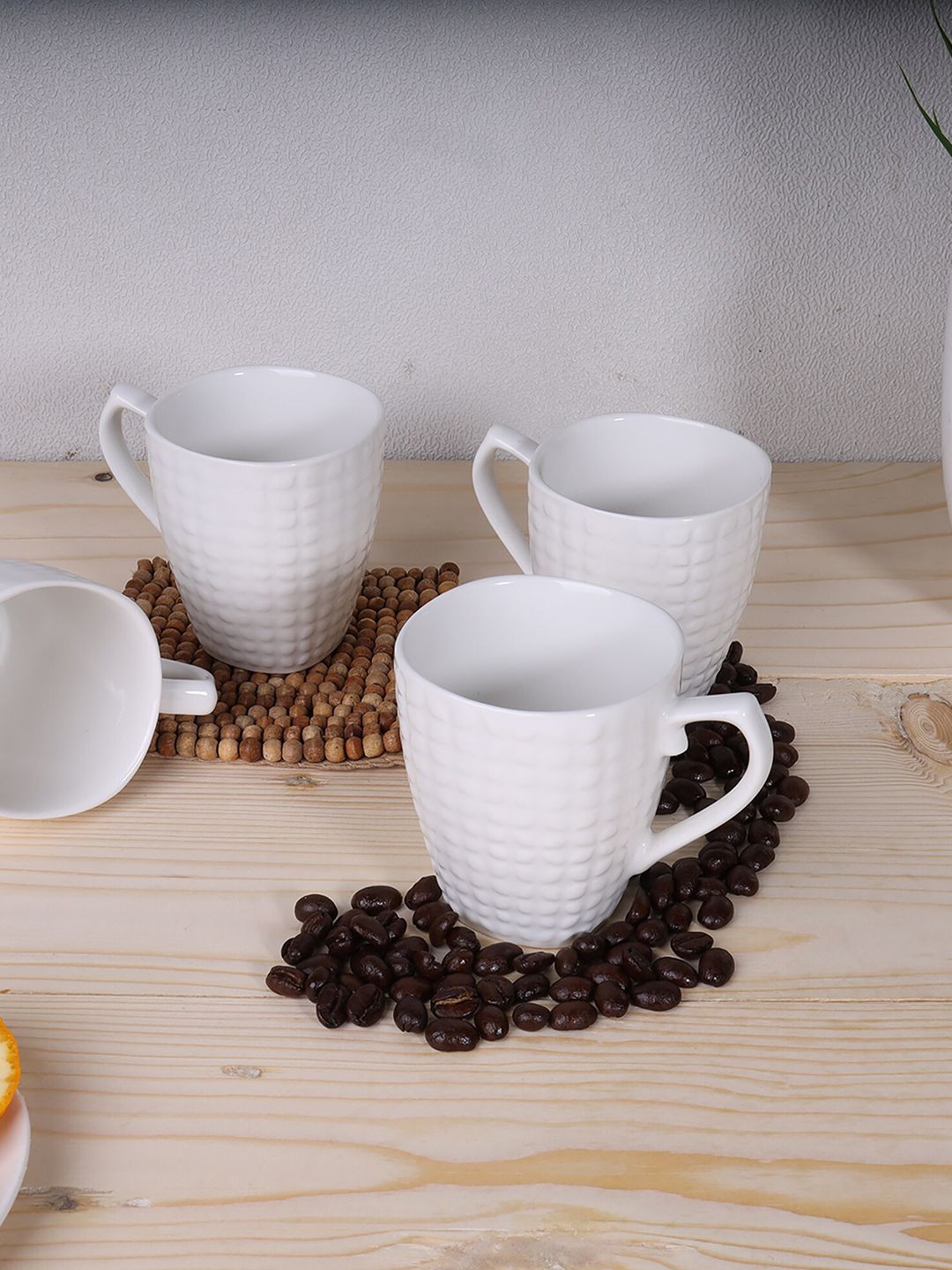 Ariane Set Of 4 White Handcrafted Textured Porcelain Glossy Dotted Expresso Cups Price in India