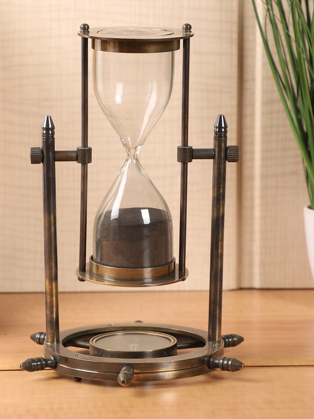 EXIM DECOR Black Sand Timer With Shipwheel Compass Price in India