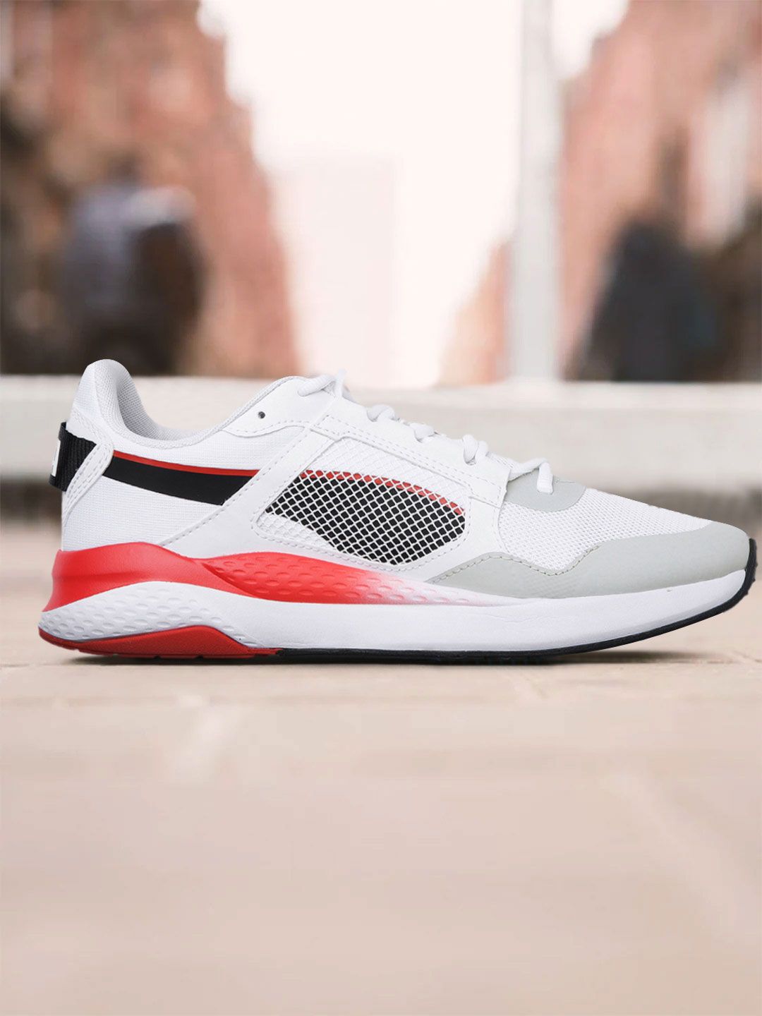 Puma Unisex White & Black Mesh SoftFoam Anzarun Grid Trainer Running Shoes Price in India