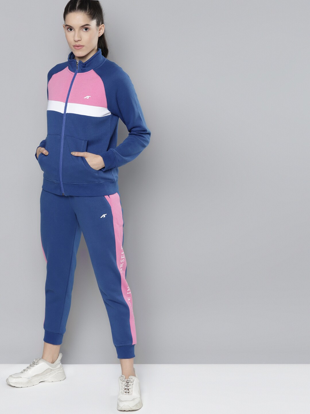 Alcis Women Blue & Pink Colourblocked Tracksuits Price in India