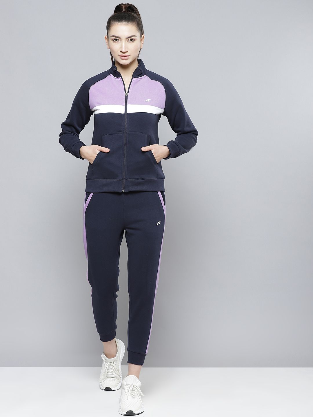 Alcis Women Navy Blue & Lavender Solid Knitted Tracksuit with Side Stripes Price in India