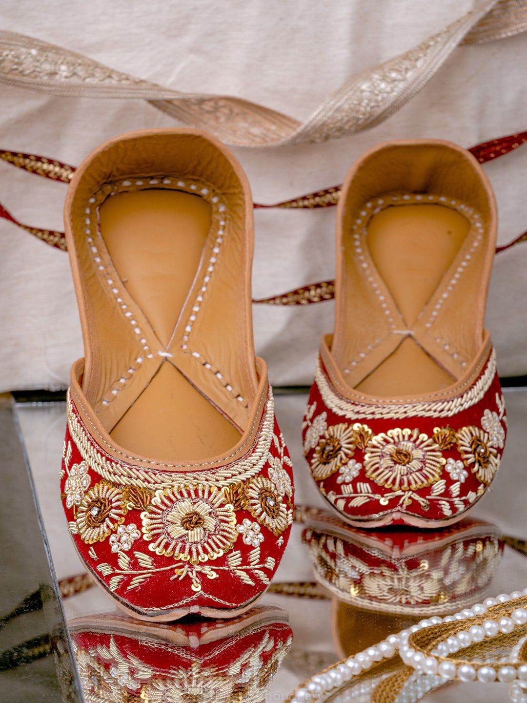 NR By Nidhi Rathi Women Maroon Hand Embroidered Leather Ethnic Mojaris Flats Price in India