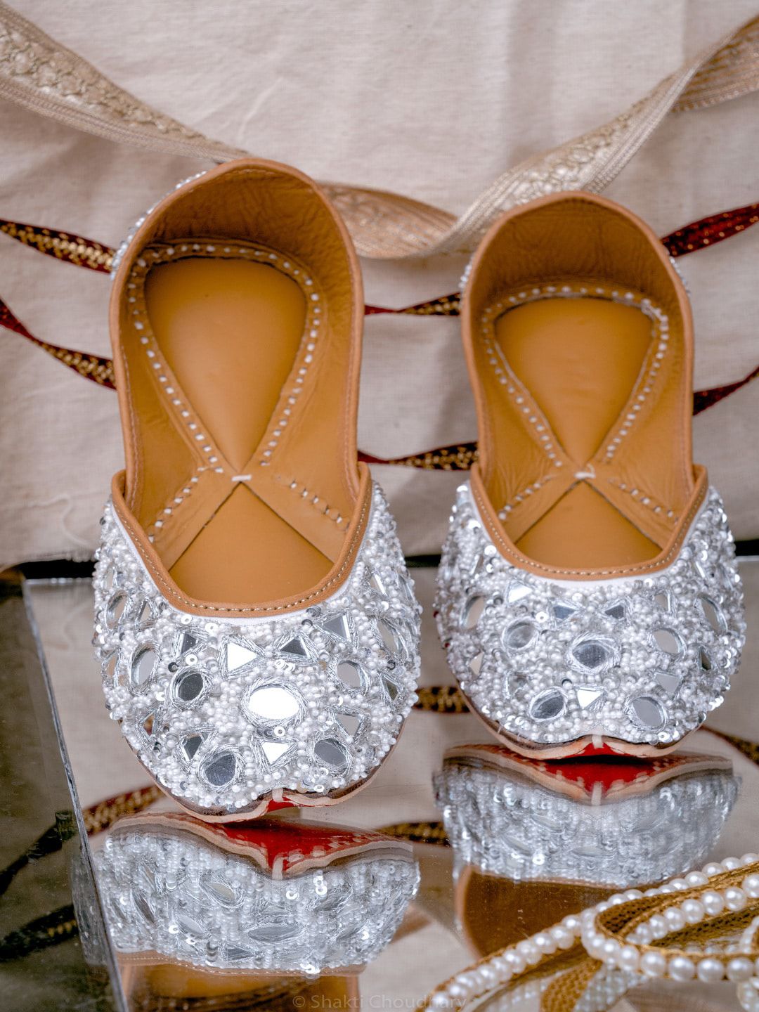 NR By Nidhi Rathi Women Silver & Tan Embellished Mojaris Flats Price in India