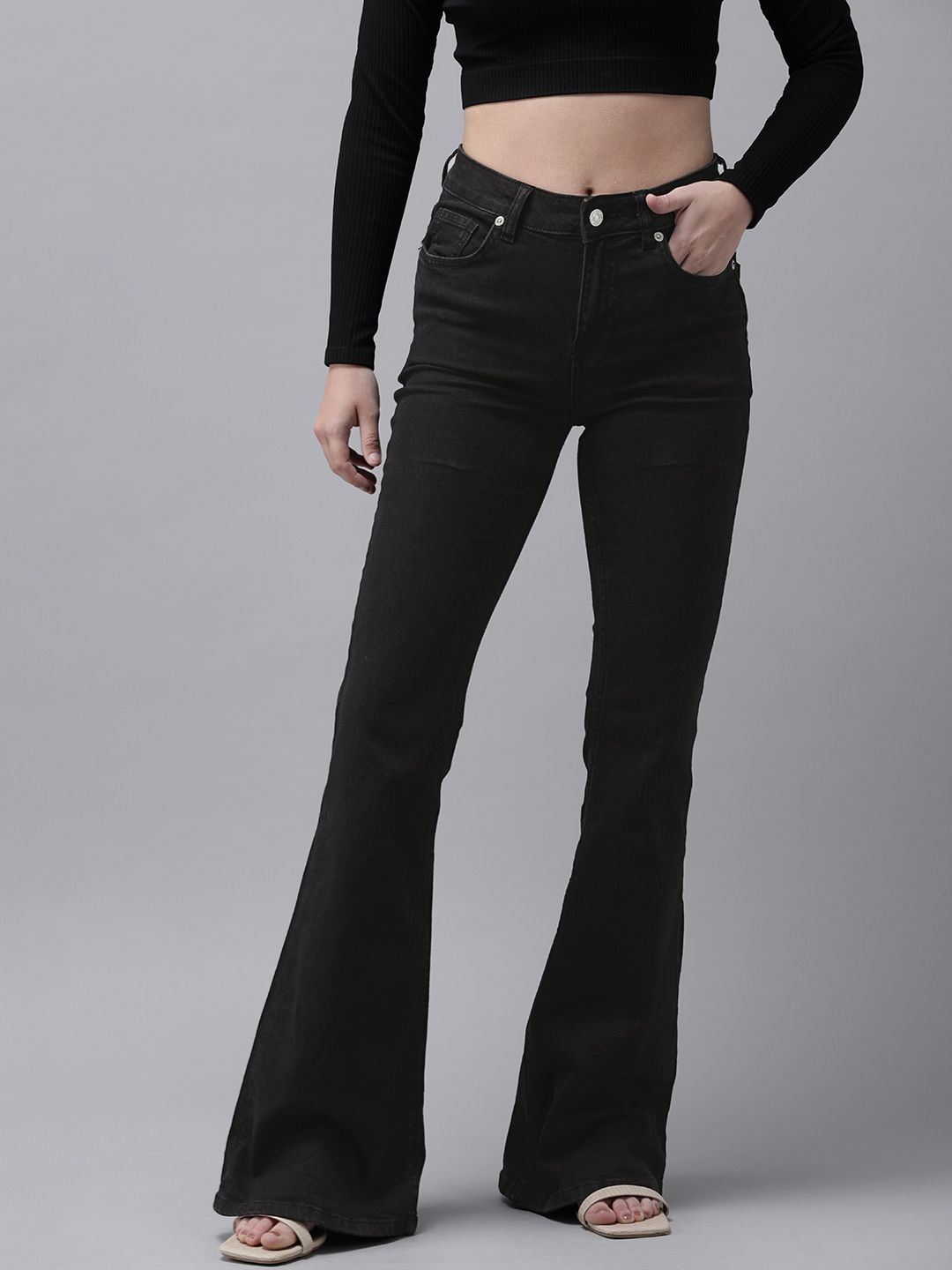 MANGO Women Black Mid-Rise Flared Clean Look Regular Stretchable Jeans Price in India