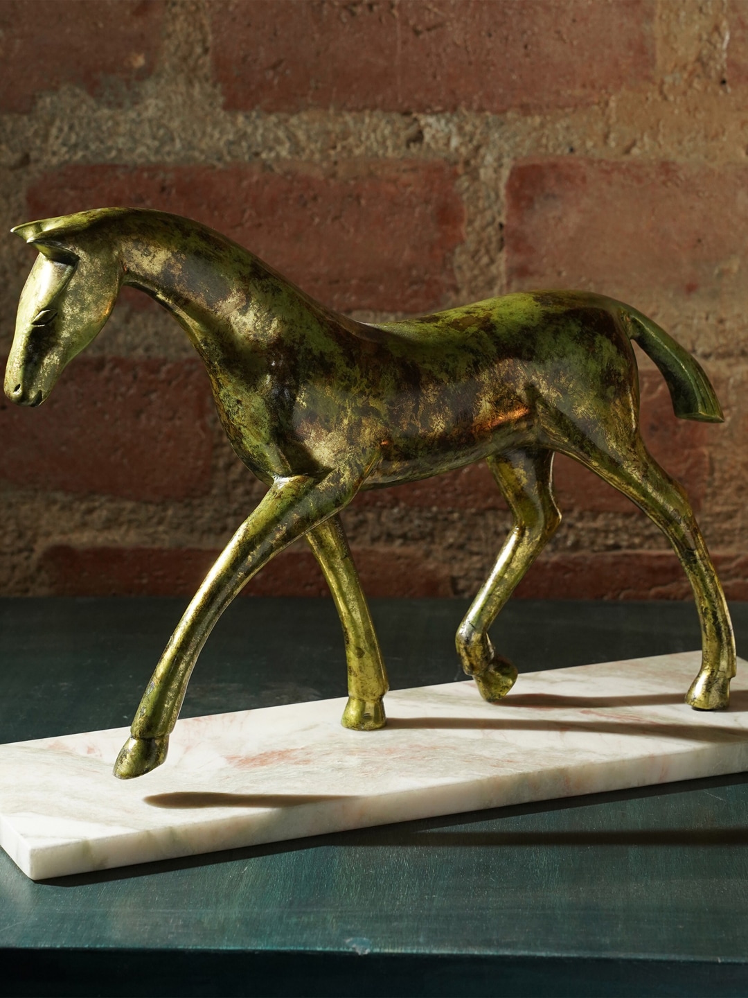 Folkstorys Green & Gold-Toned Handmade Pattina Pony Showpiece Price in India