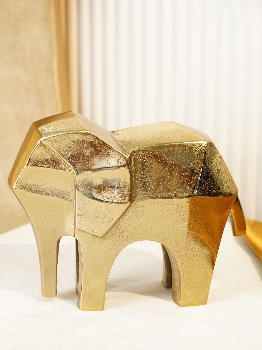 Folkstorys Gold-Toned Handmade Elephantery Showpiece Price in India