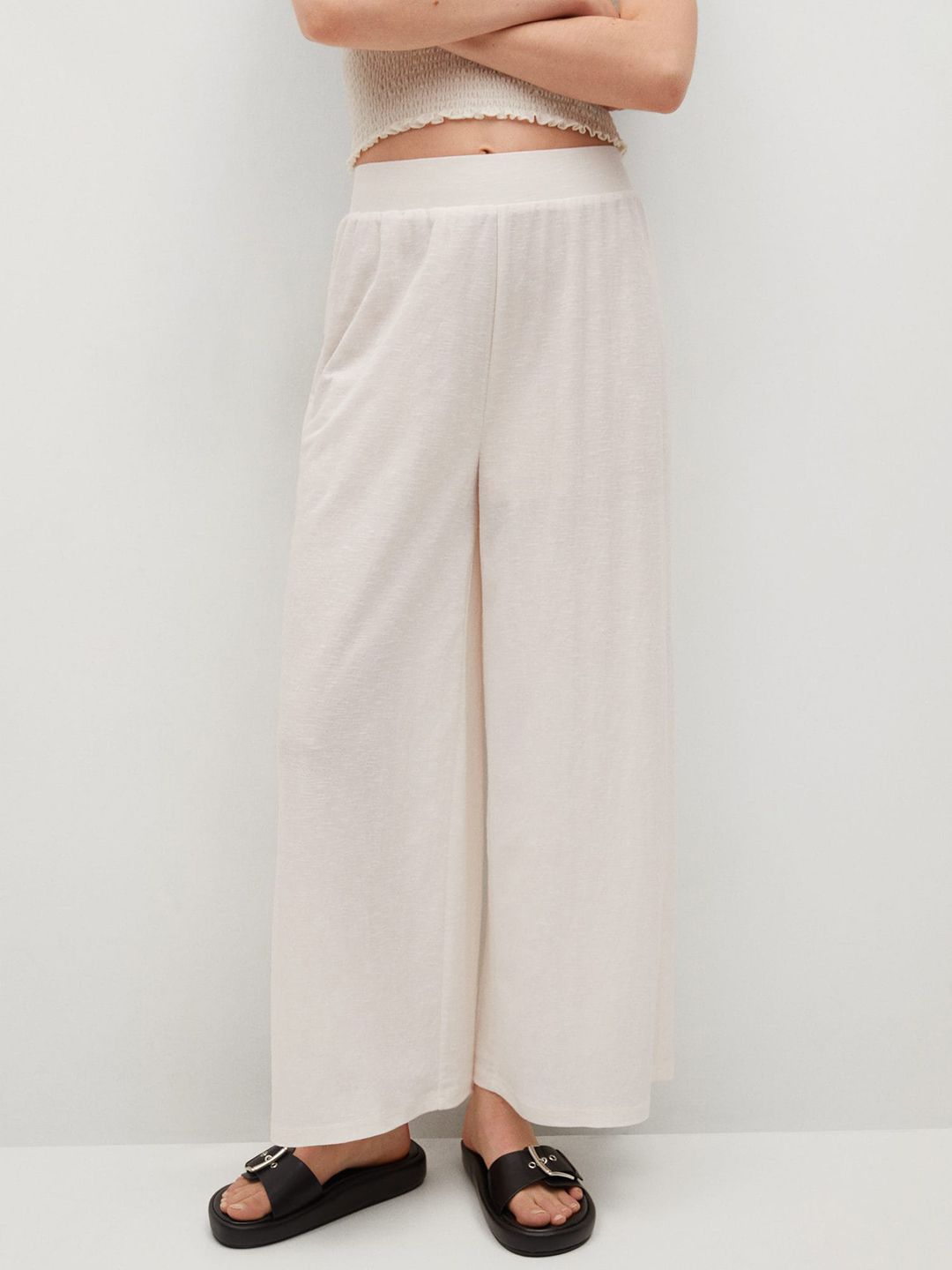 MANGO Women Off White Solid Parallel Trousers Price in India