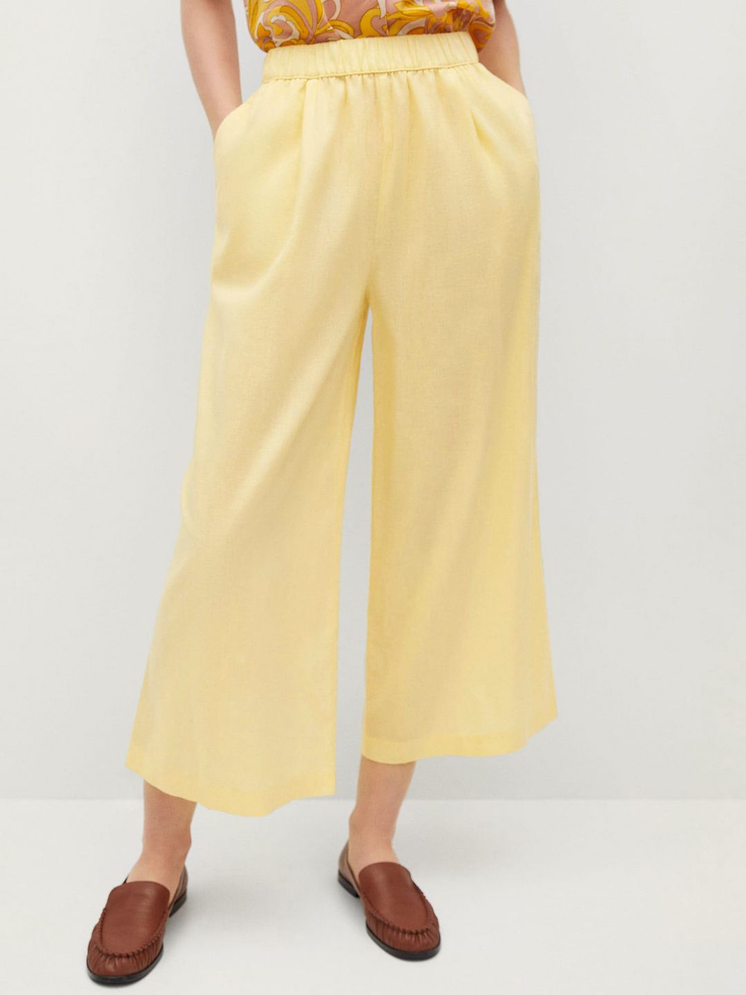 MANGO Women Yellow Solid Cropped Parallel Trousers Price in India