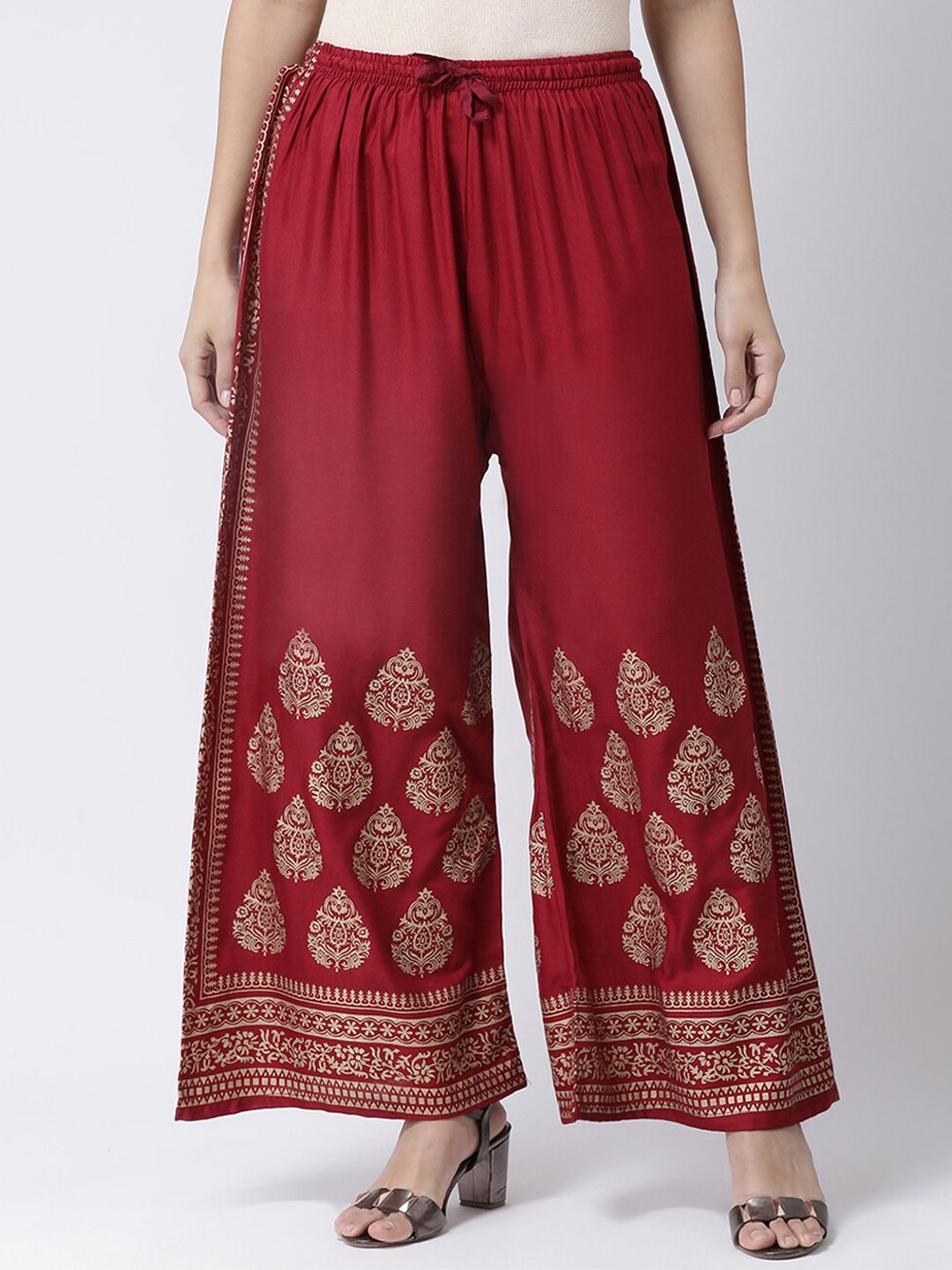 Charitra Women Maroon & Gold-Toned Ethnic Motifs Printed Flared Ethnic Palazzos Price in India