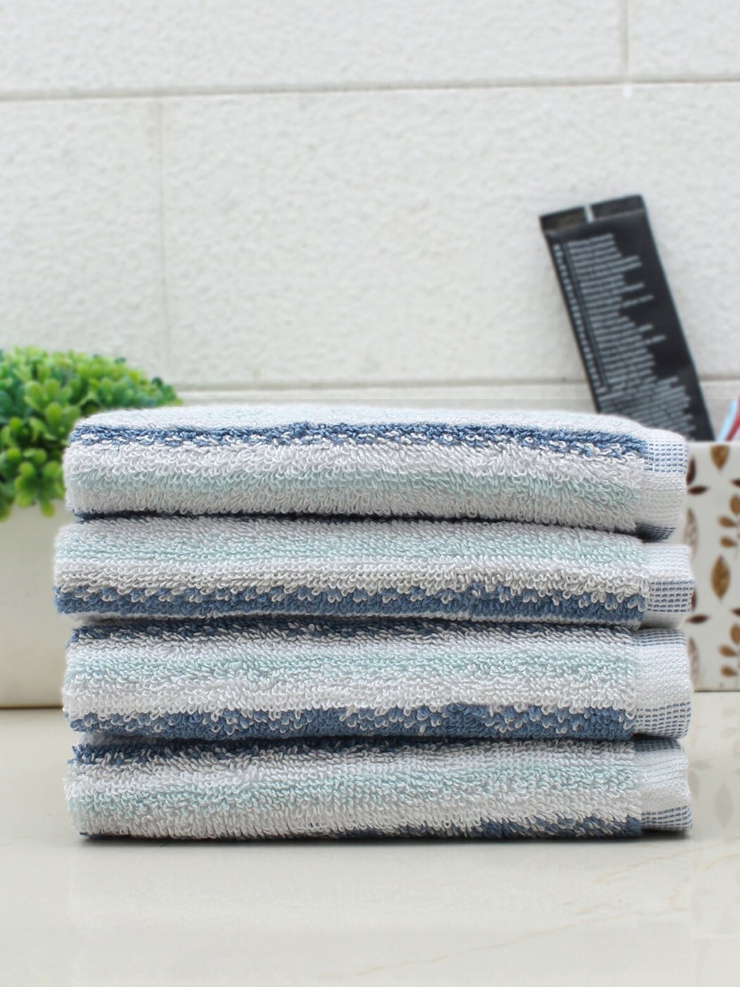 AVI Living Set Of 4 Blue & White Striped 600 GSM Face Towels Price in India